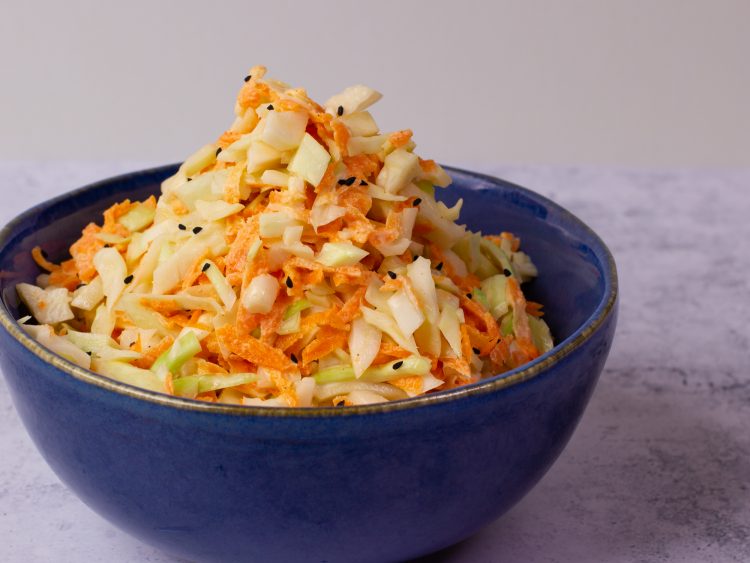 cole slaw in a blue bowl