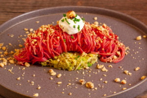 beetroot pasta with brussels sprouts and goat cheese