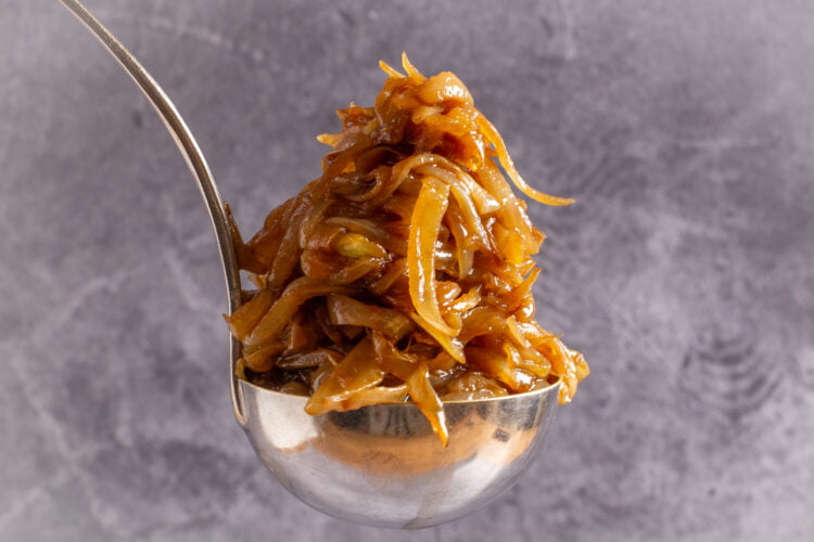 caramelized onions in a soup ladle