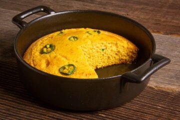 mini jalepeno cornbread in a small cast iron pan